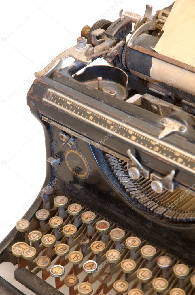 Old typewriter with a sheet of paper