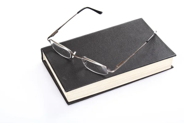 Szemüveg és könyv — Stock Fotó