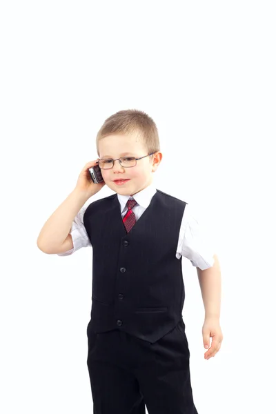 Мелкий мальчик - бизнесмен — стоковое фото