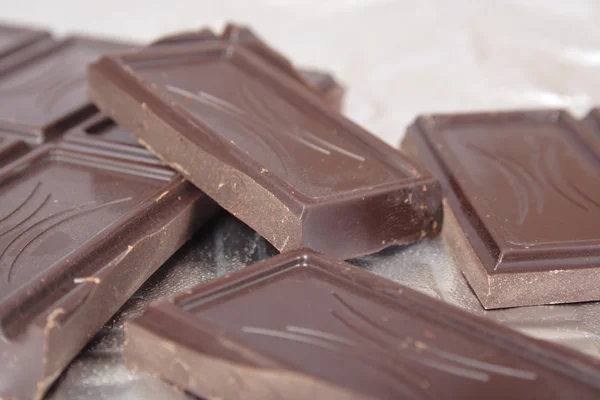 Pieces of bitter chocolate — Stock Photo, Image