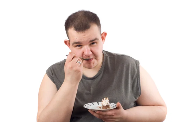 남자 먹는 케이크 — 스톡 사진
