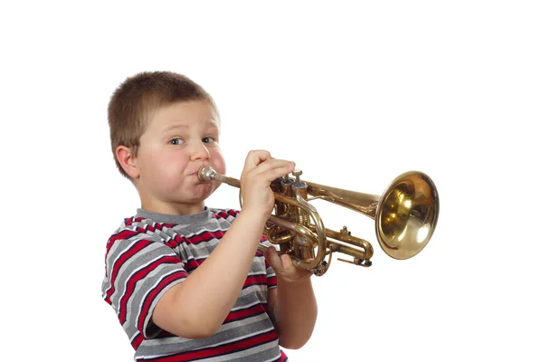 Jongen waait trompet — Stockfoto