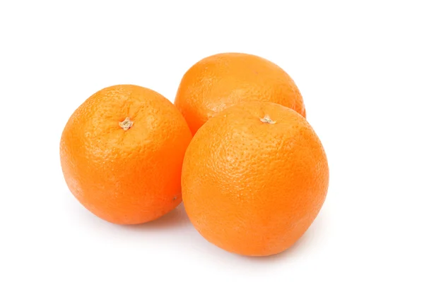 Три апельсина — стоковое фото