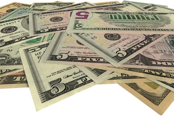 Heap, novos dólares isolados em branco — Fotografia de Stock