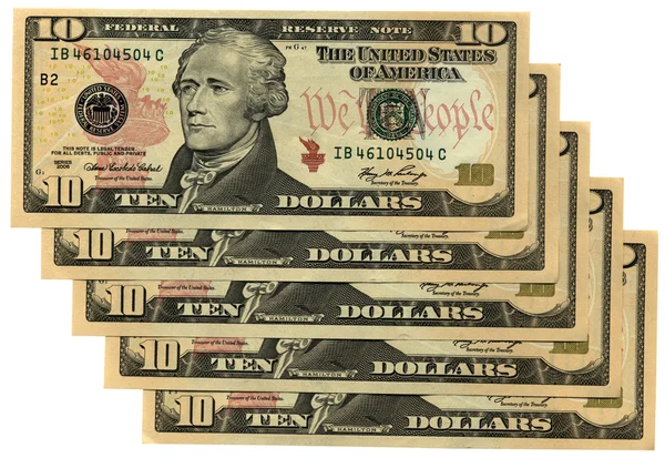 Heap of ten dollars isolated on white, s — Stock Photo, Image