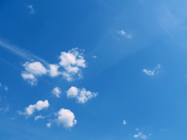 White clouds and blue sky in sunny day clipart