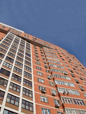 One urban high building, red brown brick clipart