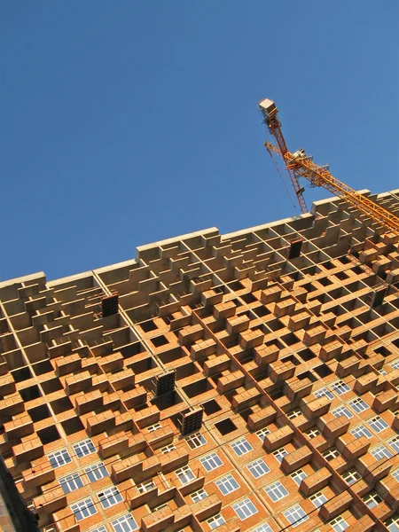 One urban red brick building, crane — Stock Photo, Image