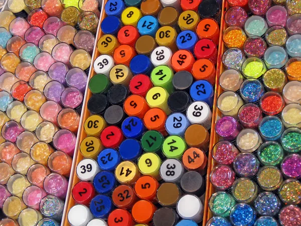 Stak farverige flasker, lotteri - Stock-foto