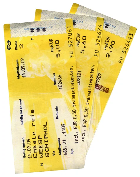 Μερικά εισιτήρια τρένων grunge κίτρινο απομονωθεί Εικόνα Αρχείου
