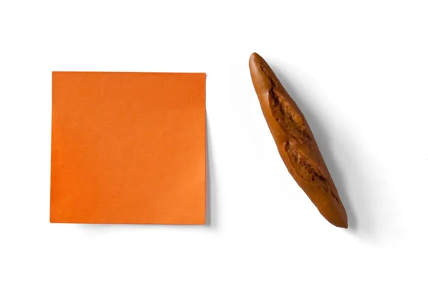 Sticky note and figure of baguet — Stock Photo, Image