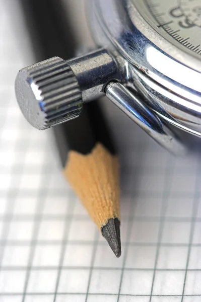 Cronómetro e caneta — Fotografia de Stock