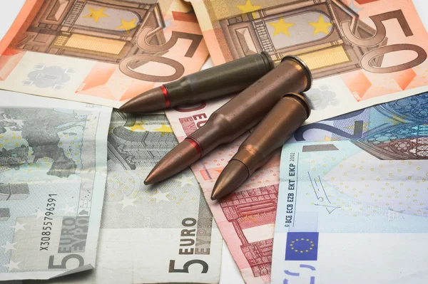 stock image Bullets and money