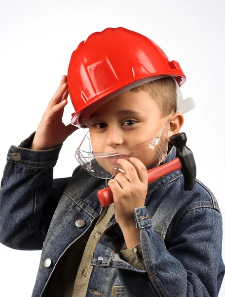 Garçon dans un casque rouge — Photo