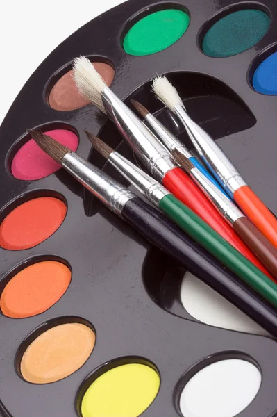 Brushes and palette — Stock Photo, Image