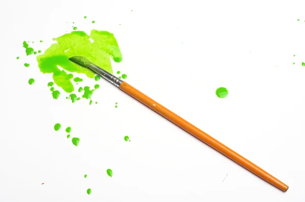 Tinta verde e escova — Fotografia de Stock