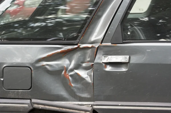 Dented car side — Stock Photo, Image