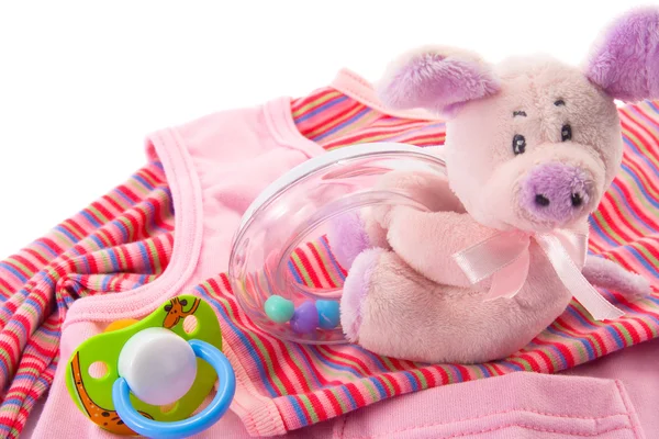Van baby kleding en speelgoed — Stockfoto