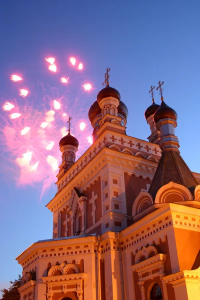 Celebratory fireworks behind chirch — Stock Photo, Image