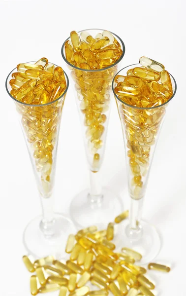 Trzy szklanki z złota bolusów — Zdjęcie stockowe