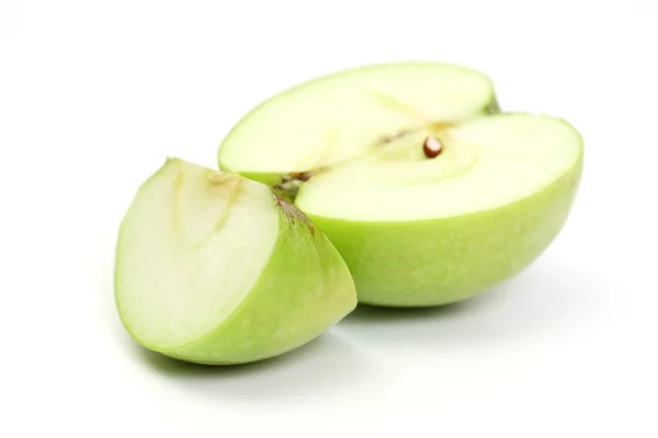 stock image Half and slice green apple