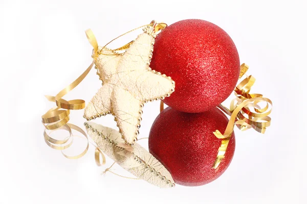Curly christmas bauble and star — Stock Photo, Image