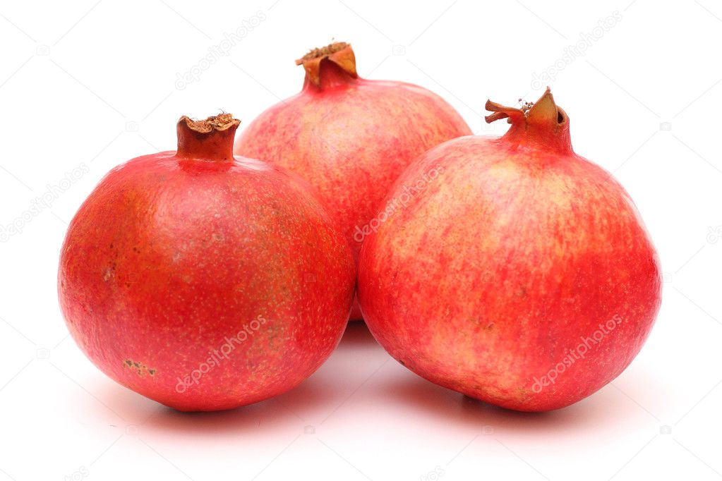 Three fresh appetizing pomegranates