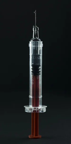 Plastic syringe — Stock Photo, Image