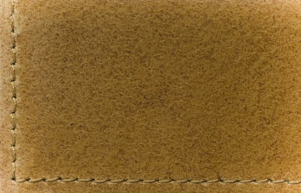 Кожа из коричневой эко с швом — стоковое фото
