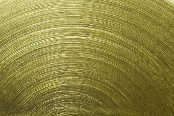 Circular scratch on gold metal — Stock Photo, Image