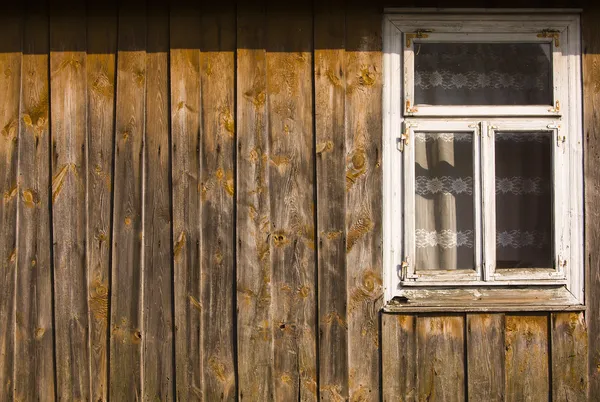 Drewniane stary Domek dom ściany i okna — Zdjęcie stockowe