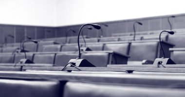 Microphones in the empty conference hall clipart