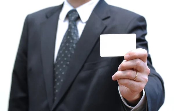 Businessman is holding business card — Stock Photo, Image