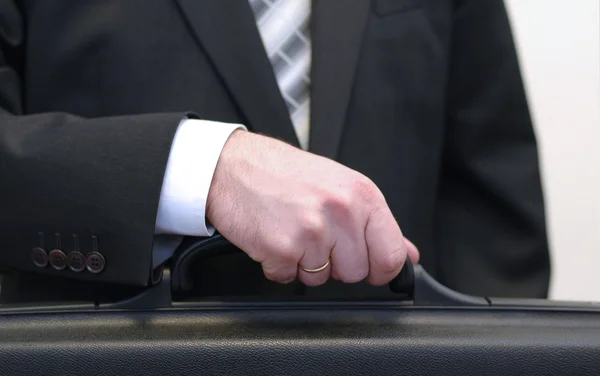Businessman holding briefcase — Stock Photo, Image