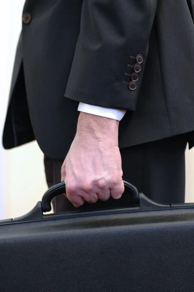 Businessman holding briefcase — Stock Photo, Image