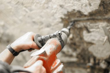 Demolition hammer in use clipart