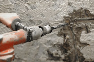 Demolition hammer in use clipart