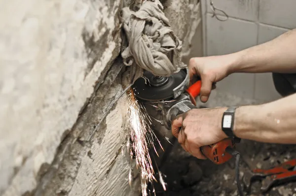 stock image Angle grinder in use