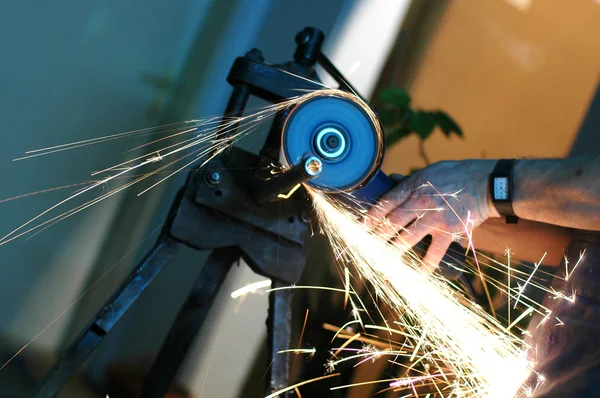 Angle grinder in use — Stock Photo, Image