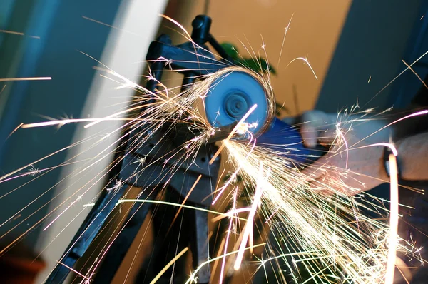 Angle grinder in use — Stock Photo, Image