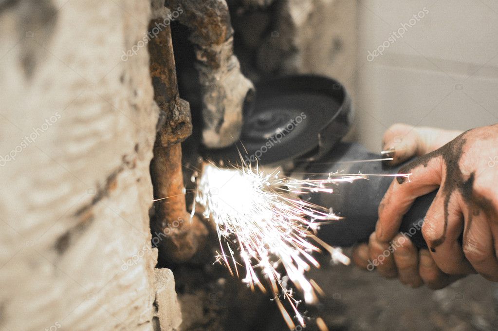 Angle grinder in use — Stock Photo © vladek 1982565