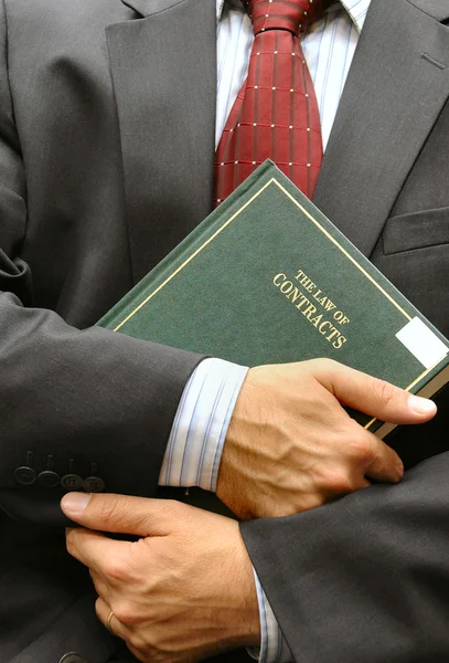 Advogado segurando um livro — Fotografia de Stock