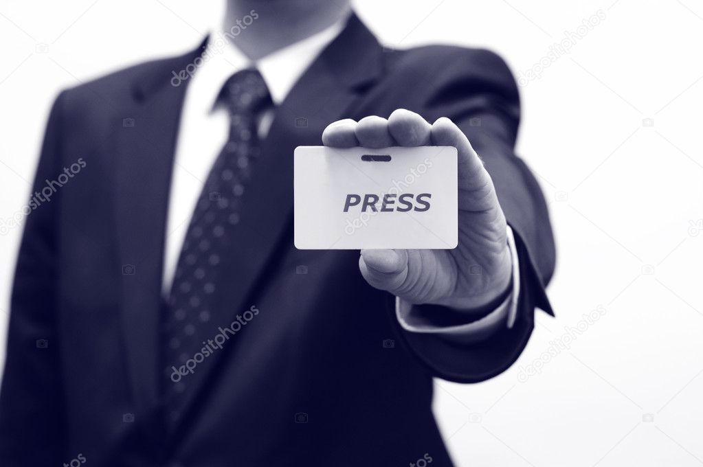 Journalist is holding press id