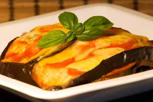 Eggplant with tomato and cheese — Stock Photo, Image