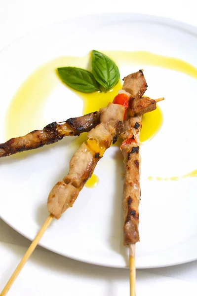 stock image Meat skewer with olive oil garnish