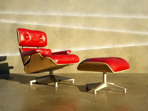 Rode stoel naar laag betonnen wand — Stockfoto