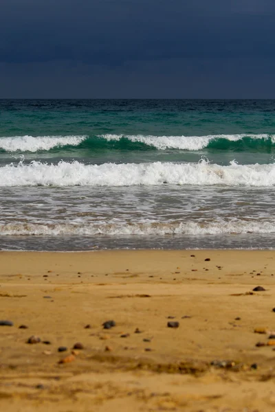 Cielo onde e sabbia — стокове фото