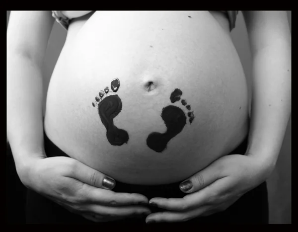 Legrační břicho těhotné ženy — Stock fotografie