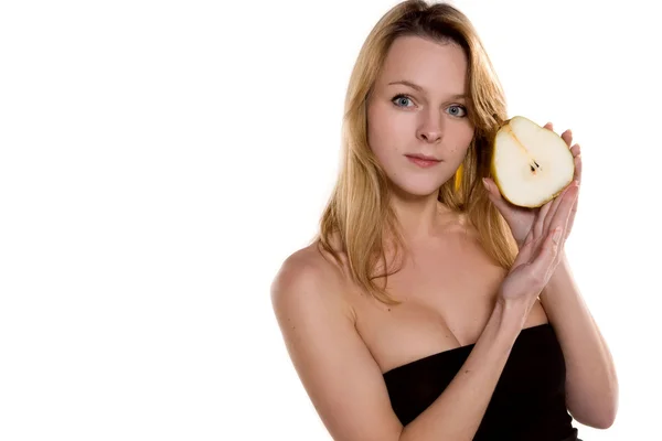 Young blonde woman with pear — Stock Photo, Image
