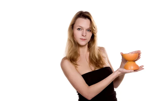 Flicka med grapefrukt — Stockfoto